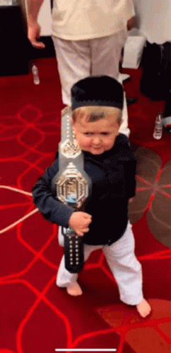 Young Boy Holding UFC Belt GIF