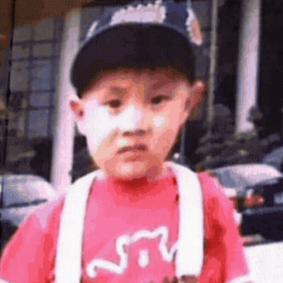 Young Boy In Baseball Cap And Red Shirt With Cat GIF