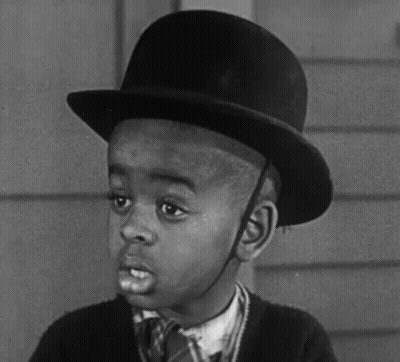Young Boy In Black Top Hat And Tie GIF