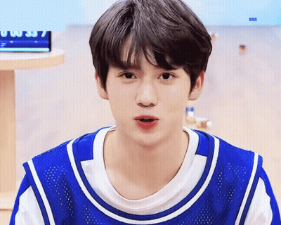 Young Boy In Blue And White Jersey Saying Sea GIF