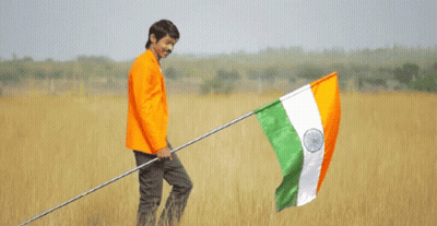 Young Boy In Blue Shirt Smiling GIF
