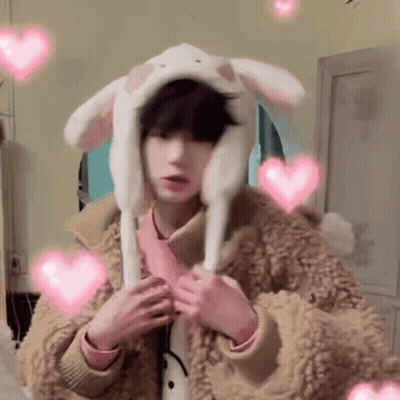 Young Boy in Bunny Hat With Pink Hearts
