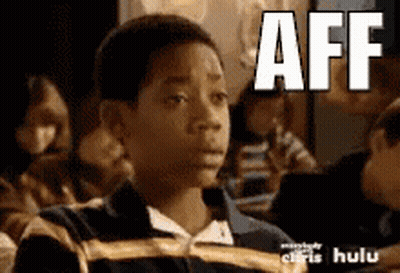 Young Boy In Classroom With Aff On Face GIF