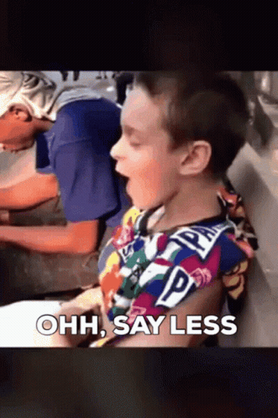 Young Boy In Colorful Shirt Saying Ohh GIF