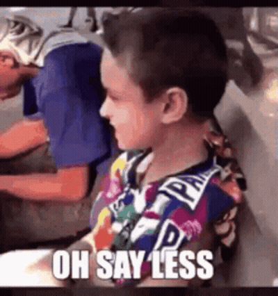 Young Boy In Colorful Shirt Says Oh Say Less Next To Man In Blue Shirt GIF