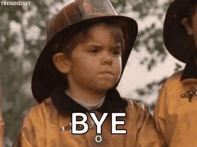 Young Boy In Fireman Hat Saying Bye Next To Another Boy GIF