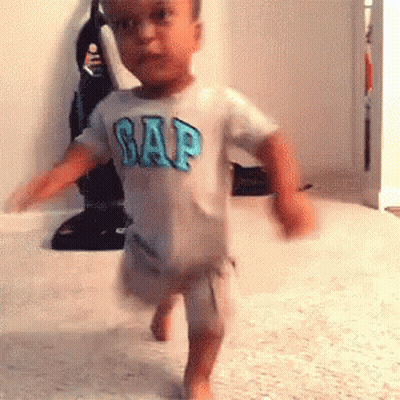 Young Boy In Gap Shirt Walking GIF