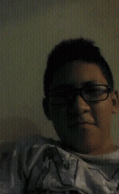 Young Boy In Glasses Wearing N Shirt GIF