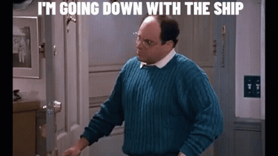 Young Boy In Green And White Baseball Uniform Holding Bat GIF