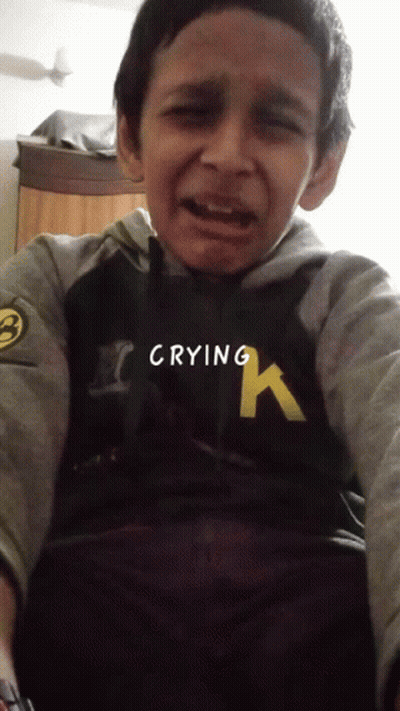 Young Boy In Hurley Sweatshirt Crying GIF