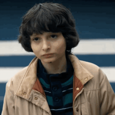Young Boy In Jacket And Striped Shirt GIF
