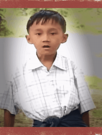 Young Boy In Plaid Shirt GIF