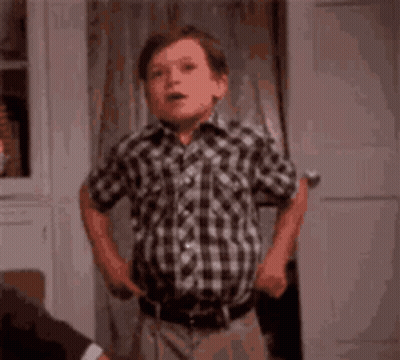 Young Boy In Plaid Shirt Saying Fashion GIF