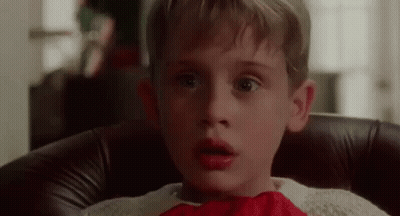 Young Boy in Red Bow Tie and Sweater