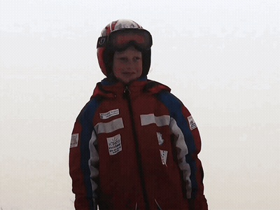 Young Boy In Red Jacket With Allianz Sticker GIF