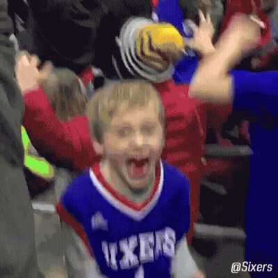 Young Boy in Sixers Jersey Screaming