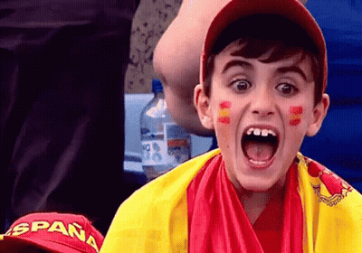 Young Boy In Spain Hat And Yellow Red Scarf GIF