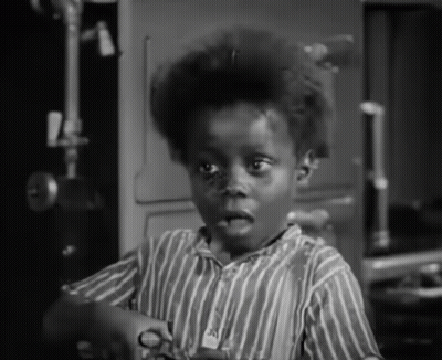 Young Boy In Striped Shirt With A GIF