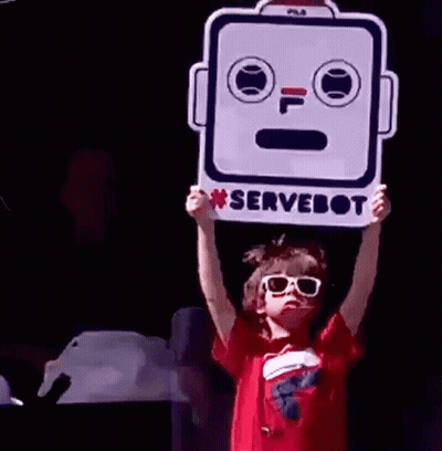 Young Boy In Sunglasses Holding Robot Sign GIF