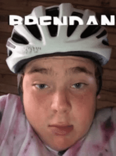 Young Boy In White Helmet With Name Brendan GIF