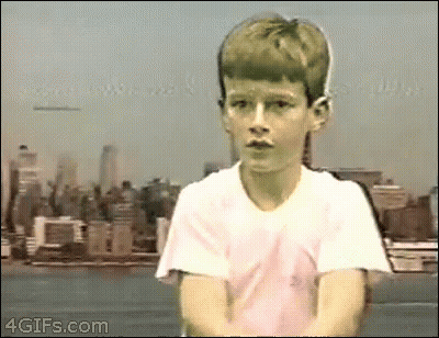 Young Boy In White Shirt With City Skyline GIF