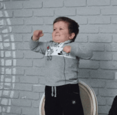 Young Boy In World Blitzer Sweater GIF