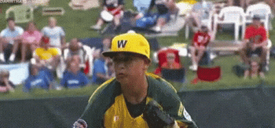 Young Boy In Yellow Hat With Letter W Playing Baseball GIF