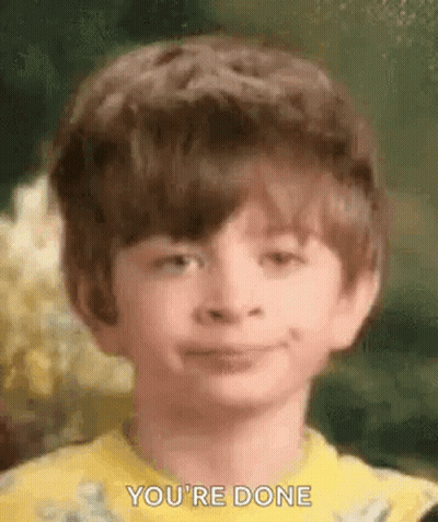 Young Boy In Yellow Shirt Smiling GIF