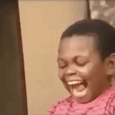 Young Boy Laughing With Mouth Wide Open GIF