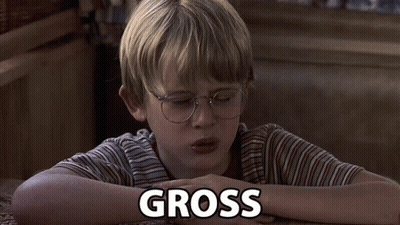 Young Boy Laying Down With Gross Above GIF