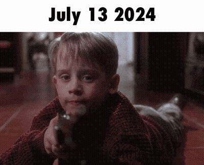Young Boy Laying On Floor Pointing Gun July 13 2024 GIF