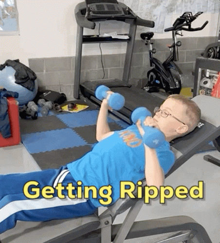Young Boy Lifting Dumbbells Getting Ripped GIF