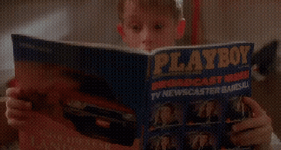 Young Boy Looking Into Drawer GIF