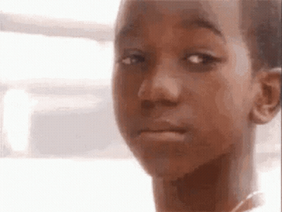 Young Boy Making Funny Face GIF