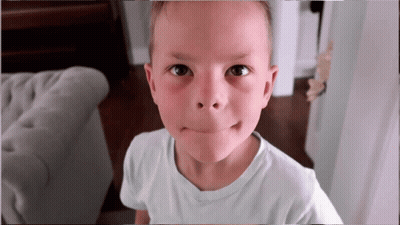 Young Boy Making Funny Face GIF
