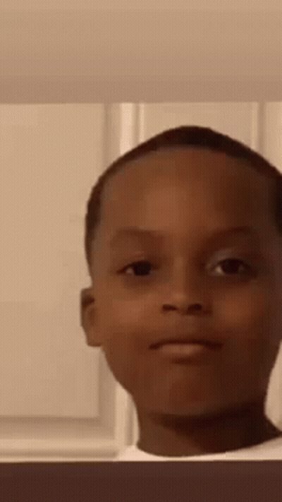 Young Boy Making Funny Face GIF