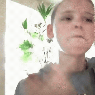 Young Boy Making Funny Face And Thumbs Up GIF