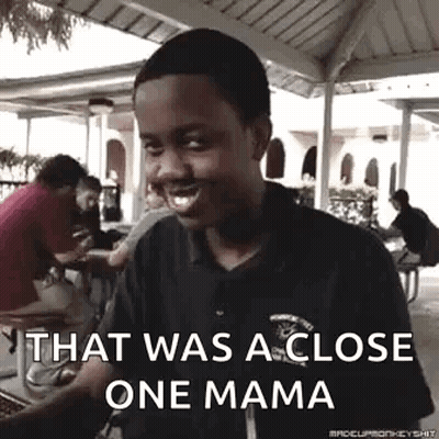 Young Boy Making Funny Face At Picnic Table GIF