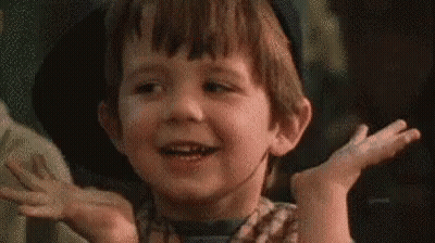 Young Boy Making Funny Face Hands In Air GIF