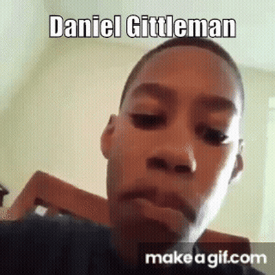 Young Boy Making Funny Face In Chair GIF