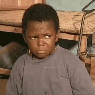 Young Boy Making Funny Face GIF