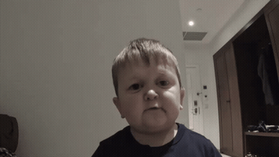 Young Boy Making Funny Face With Open Mouth GIF