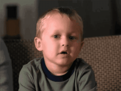 Young Boy Making Funny Face GIF
