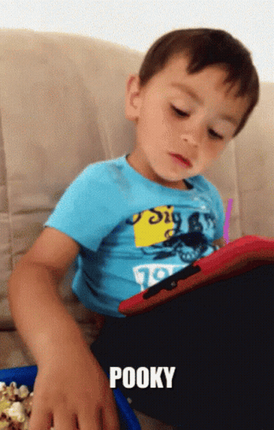 Young Boy On Couch With Pooky GIF