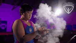 Young Boy Putting Chalk On His Hand GIF