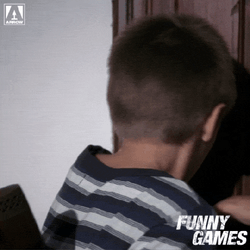 Young Boy Reaction After Being Caught GIF
