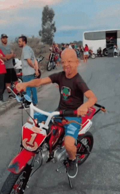 Young Boy Riding Dirt Bike Number 1 GIF