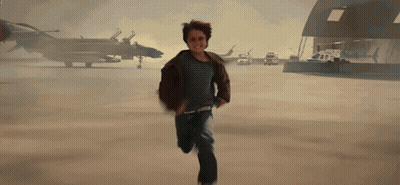Young Boy Running On Airport Runway GIF