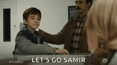 Young Boy Says Let's Go Samir At Table With Man And Woman GIF