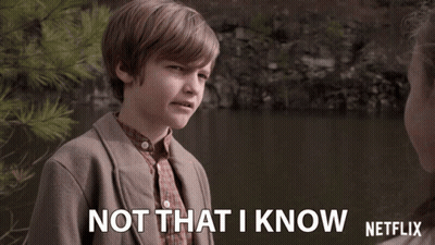 Young Boy Says Not That I Know In Front Of Lake GIF
